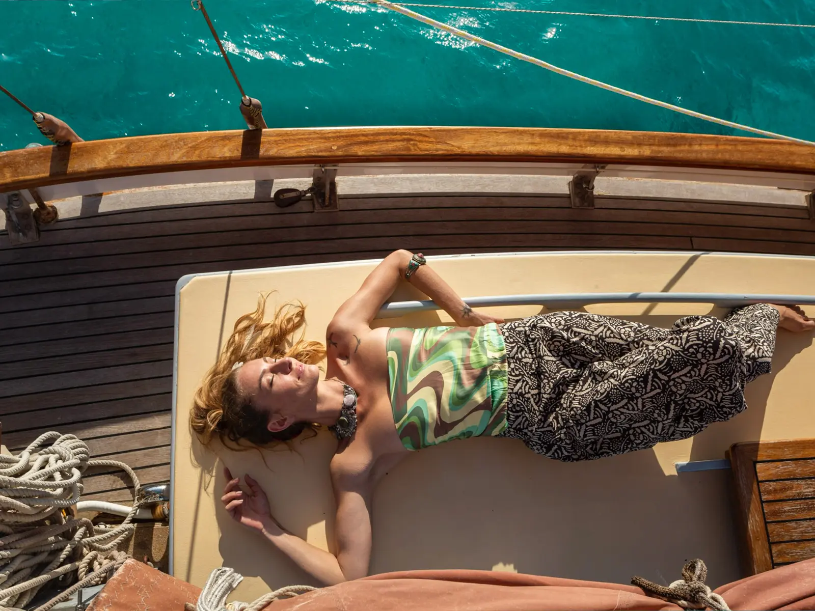 Tyrell & Young 29 Smack at anchor – Sunset sailing tour Mallorca