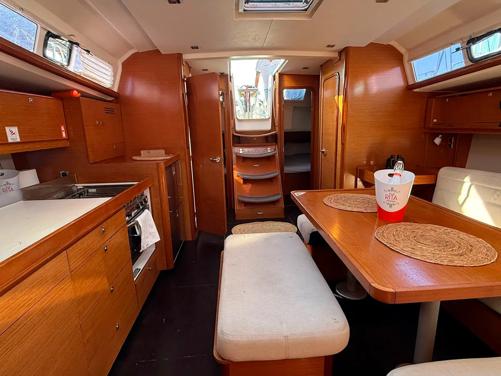 Dufour 460 Grand Large at anchor – Day charter Mallorca coastline